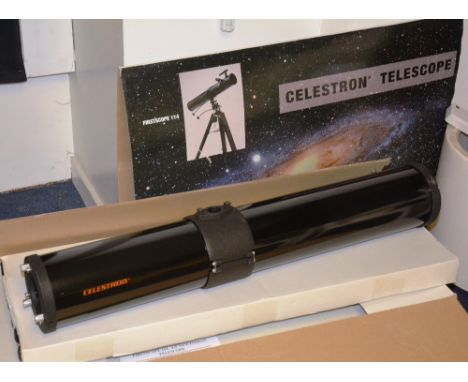 A celestron telescope Firstscope 114, with tripod, in original box