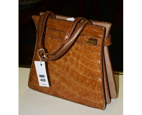 A vintage crocodile skin handbag, with strap carry handles, 23.5cm high