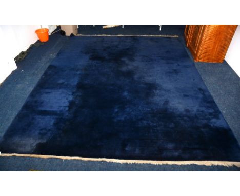 A Chinese carpet, the blue ground with floral design, 356 x 276cm CONDITION REPORT: Lot 611 - some minor marks and colour fad