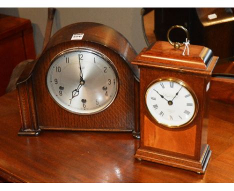 A 1940's oak mantle clock by Smiths Enfield, 23cm high, together with a modern mahogany mantle clock by Knight & Gibbons Lond