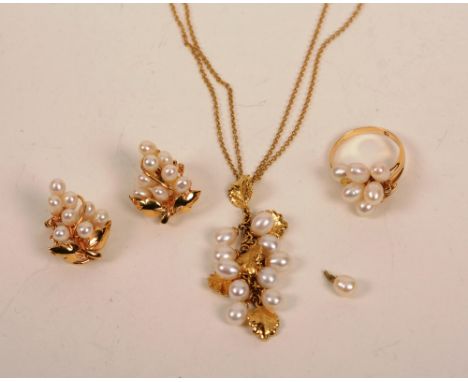 An 18ct and 14ct gold pearl pendant, ring and earring near set, the 14ct gold ring set with six pearls and three mili diamond