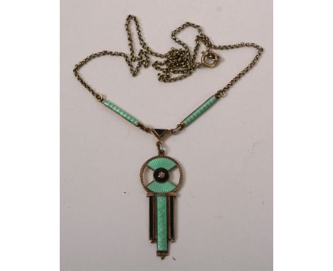 An Art Deco silver and enamel pendant on chain, with green and black enamel decoration, inscribed to reverse 'Arendal 14.7.36