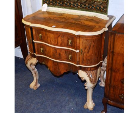 A Queen Anne style walnut commode chest, with shaped top above two serpentine shaped drawers, shaped apron, flanked by panell