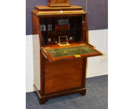 An Edwardian mahogany inlaid writing bureau, with hinged drop flap enclosing inkwell and pigeon holes, above single drawer an