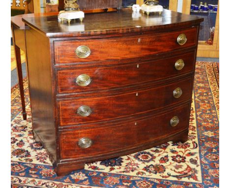 A George IV mahogany bowfront chest of drawers, with four graduated drawers, raised on bracket supports, 95cm high x 111cm wi