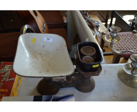 A set of kitchen scales and weights 