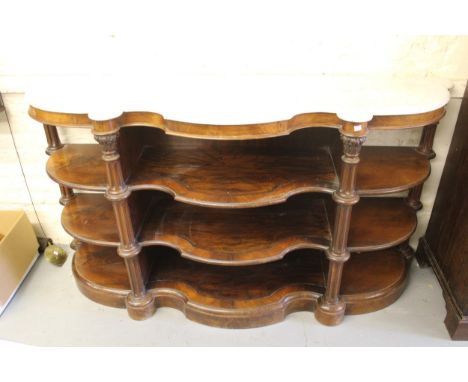 Victorian walnut open shelf credenza side cabinet, the shaped marble top above shaped open shelves, carved, turned and fluted