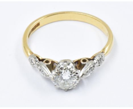 18ct Yellow gold diamond solitaire ring with diamond set shoulders, size P, 3.1gDiamond approximately 5mm diameter.Small incl