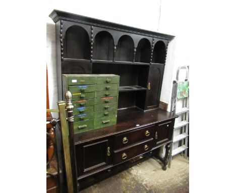 Early 20th Century oak dresser with boarded shelf back and cupboards, above an arrangement of drawers and cupboard doors, 154