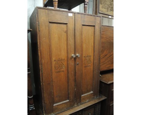 Large late 19th / early 20th Century cigar cabinet with two panelled doors, inscribed ' H De Cabanas Y Carbejal ', with shelv