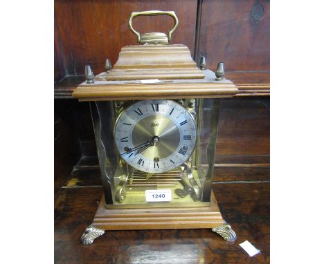 Schatz German wooden and gilt brass mantel clock, together with a black slate mantel clock