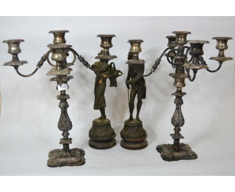 Pair of five light candelabra and a pair of spelter figures of a lady and gentleman