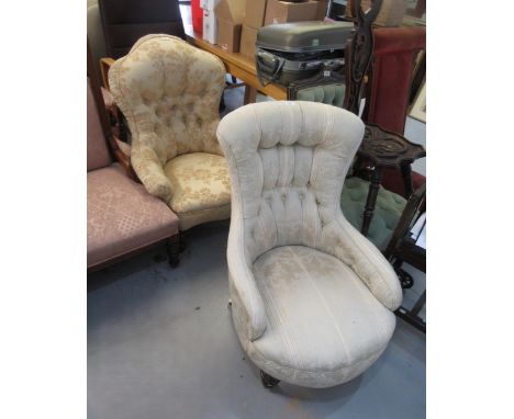 19th Century button floral upholstered low seat nursing chair on turned front supports, together with another similar