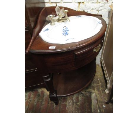 Mahogany corner washstand with inset pottery basin