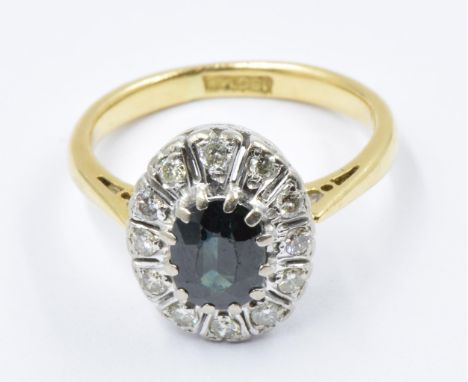 18ct Yellow gold oval sapphire and diamond cluster ring, size M, 4.8g