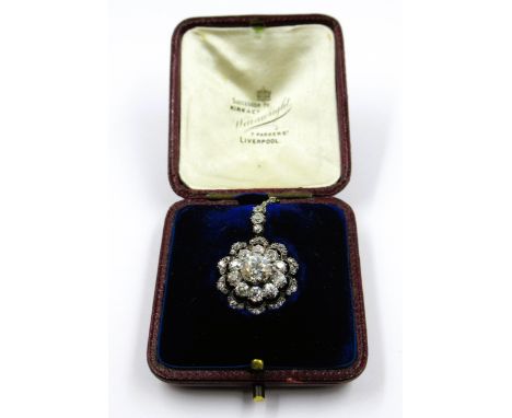 Fine late 19th / early 20th Century circular diamond set pendant on chain, the centre stone approximately 1.30ct surrounded b