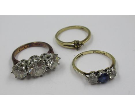 9ct Gold three stone zircon set ring, together with a 9ct gold three stone paste ring and a 9ct gold shank, gross weight 8.8g