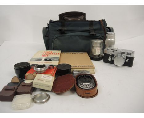 Leica M3 camera outfit, serial number 984346 with original leather case, together with three lenses, 2.8/50, 4.5/135 and 4/90