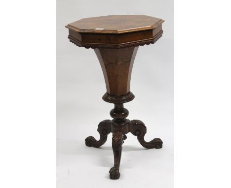 Victorian figured walnut trumpet shaped work table, the hexagonal hinged top enclosing a fitted interior, on turned column an