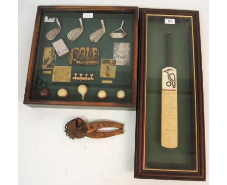 Miniature wooden cricket bat, signed by Sussex County Cricket Club, housed in a glazed frame, together with a framed golfing 