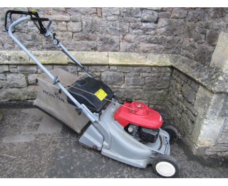 A Honda HRB476C petrol driven rotary lawn mower with moulded plastic deck