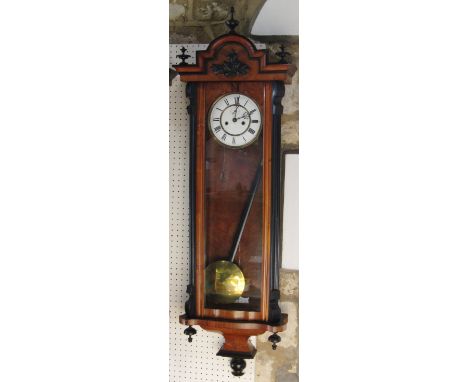 Biedermeier Vienna wall clock, with ebonised and fruitwood case, twin train enamel dial and chapter ring with Roman numerals 
