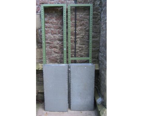 A green painted light steel framed racking unit, with 10 adjustable galvanised shelves and three floor standing uprights 190c