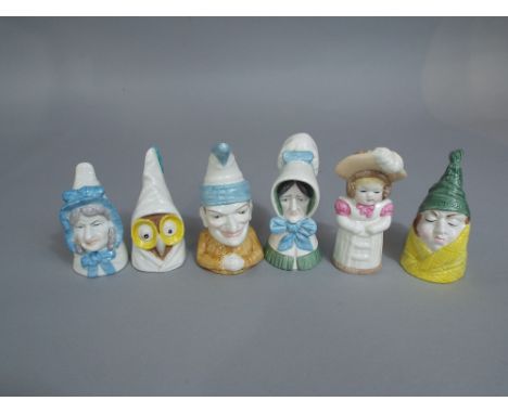 A collection of six Royal Worcester candle snuffers, Owl, Old Woman, Punch, Feathered Hat and Mr and Mrs Caudle