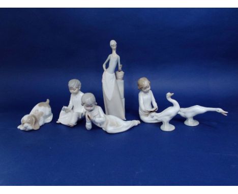 Two Lladro figures of geese, three Nao figures of children in their night clothes, a Nao puppy and a further Lladro type matt