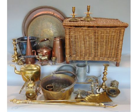 A collection of antique metal ware to include spirit kettle, lantern clock, various candlesticks and fire irons, etc