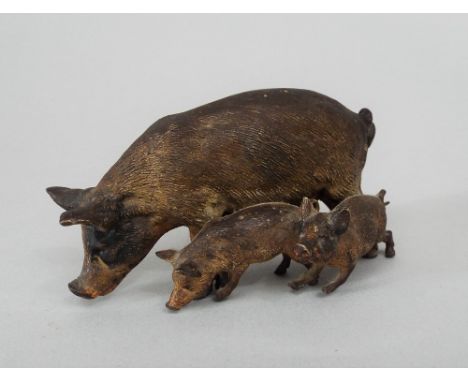 Austrian cold painted bronze group by Geschutzt of a sow and two piglets, 10cm