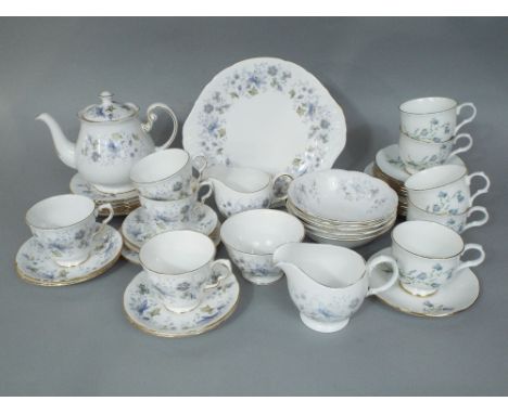 A collection of Colclough Rhapsody in Blue teawares including cake plate, teapot, two milk jugs, sugar bowl, etc, together wi