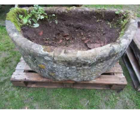 A large natural stone D shaped trough, thick walled (af) approx 138cm wide x 74cm deep x 50cm high