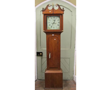 An early 19th century and walnut crossbanded longcase clock, the square cut painted dial with eight day striking movement, su