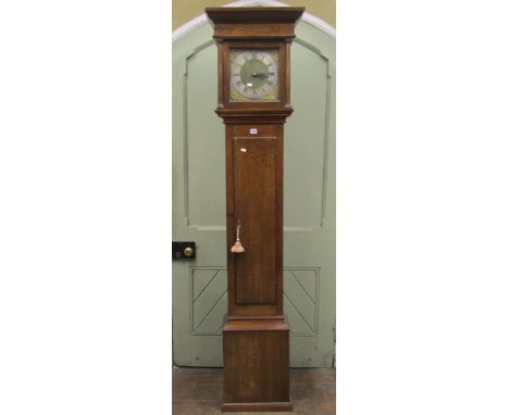 An oak longcase clock, the square cut hood with column supports enclosing a 10 inch square brass dial, with silvered chapter 