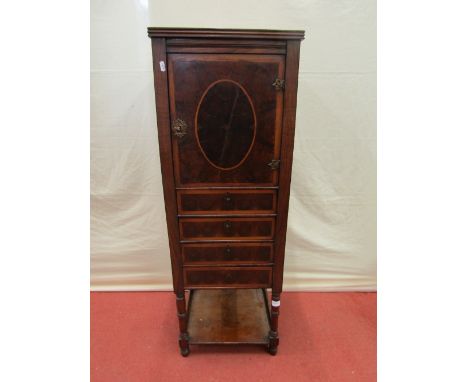 A 19th century cabinet in mixed woods (but enclosing earlier timbers) the front elevation enclosed by four frieze drawers and