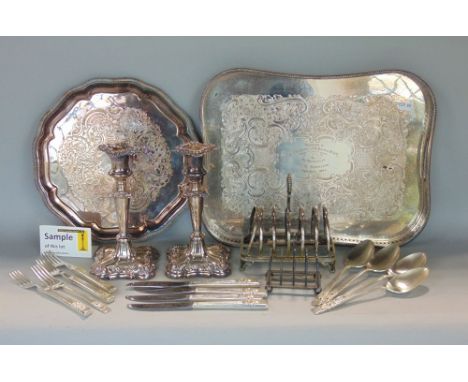 A box containing a collection of silver plate to include a gallery tray, salver, pair of candlesticks, large quantity of flat