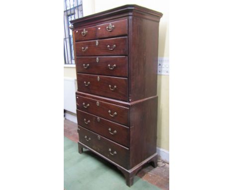 A Georgian mahogany chest on chest, the lower section fitted with three long drawers, the upper with three long and two short