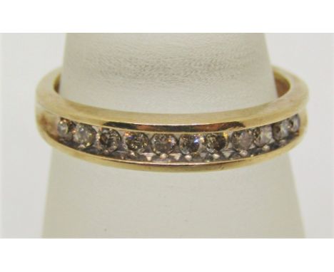 9ct channel set diamond half hoop ring, size J/K, 2.1g 