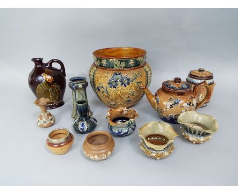 A collection of Doulton ceramics including a jardiniere with stylised floral and foliate detail, 19cm diameter approx, a Slat
