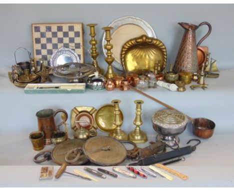 A large collection of miscellaneous items to include mainly metalware comprising brass candlesticks, copper jugs, various oth