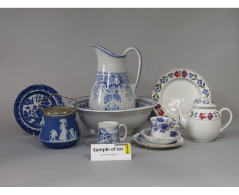 A collection of 19th century and later blue and white printed ceramics including a jug and basin set with fuchsia pattern det