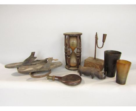 A box of interesting items to include a rush light and cutter, gun powder flask, egg timer, carved hardwood rhino, interestin