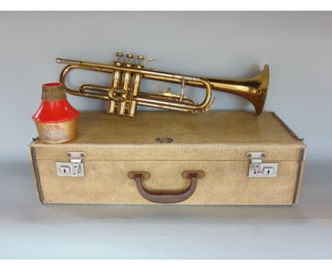 Cased gold plated Boosey and Hawkes gold plated trumpet with muting device 