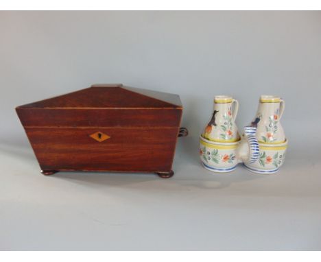 Early 19th century mahogany and boxwood inlaid sarcophagus tea caddy, the hinged lid enclosing a part fitted interior with tw