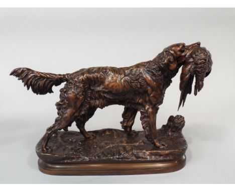 Good cast bronze study of a retriever with a pheasant in his mouth, upon a naturalistic oval base, by Jose Moignies 55 cm lon