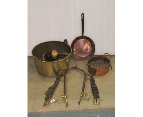 A heavy 19th century brass/bell metal jam pan (lacks handle) containing a small oval copper and brass planter, a brass clock 