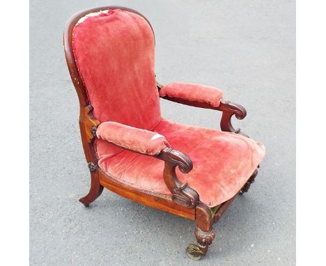 A patent recumbent easy chair by R Daws in mahogany, with impressed marks to rear legs and further paper label with instructi