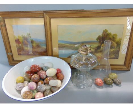 An enamel basin filled with a large collection of marble or hardstone eggs; together with a pair of Edwardian watercolours an