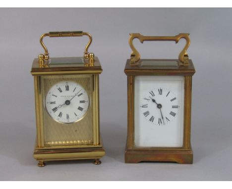 Taylor and Bligh of England gilt brass case carriage clock with engine worked gilt mask and enamelled dial, 12 cm high; toget